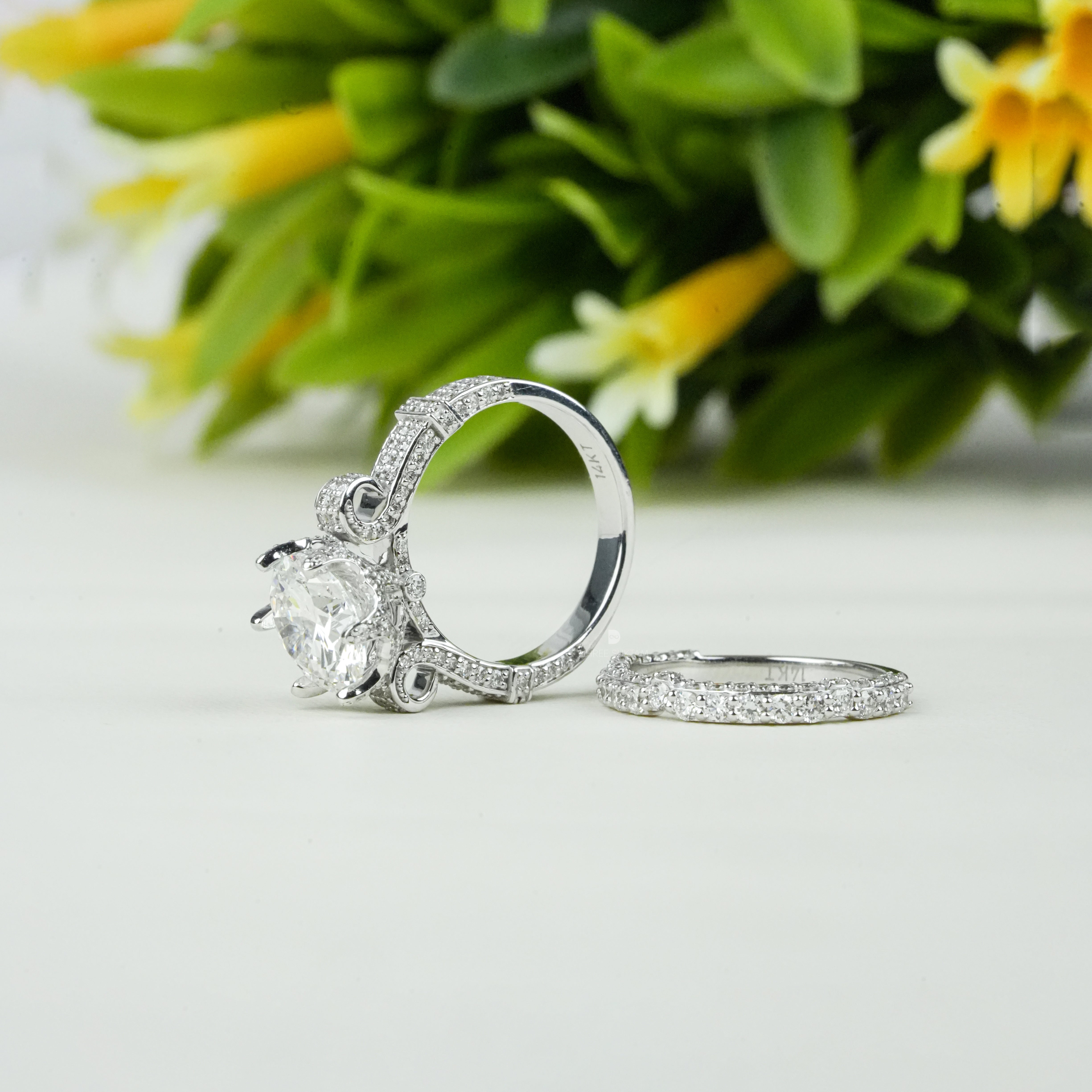 diamond engagement ring

round cut solitaire

white gold bridal set

pavé diamond band

luxury wedding ring

anniversary gift jewelry

solitaire engagement ring

classic bridal ring

women’s fine jewelry

proposal ring modern luxury, making it perfect for engagements, weddings, anniversaries, or special occasions. The brilliant-cut stone and dazzling side diamonds enhance brilliance and elegance, ideal for a classic yet glamorous jewelry statement.