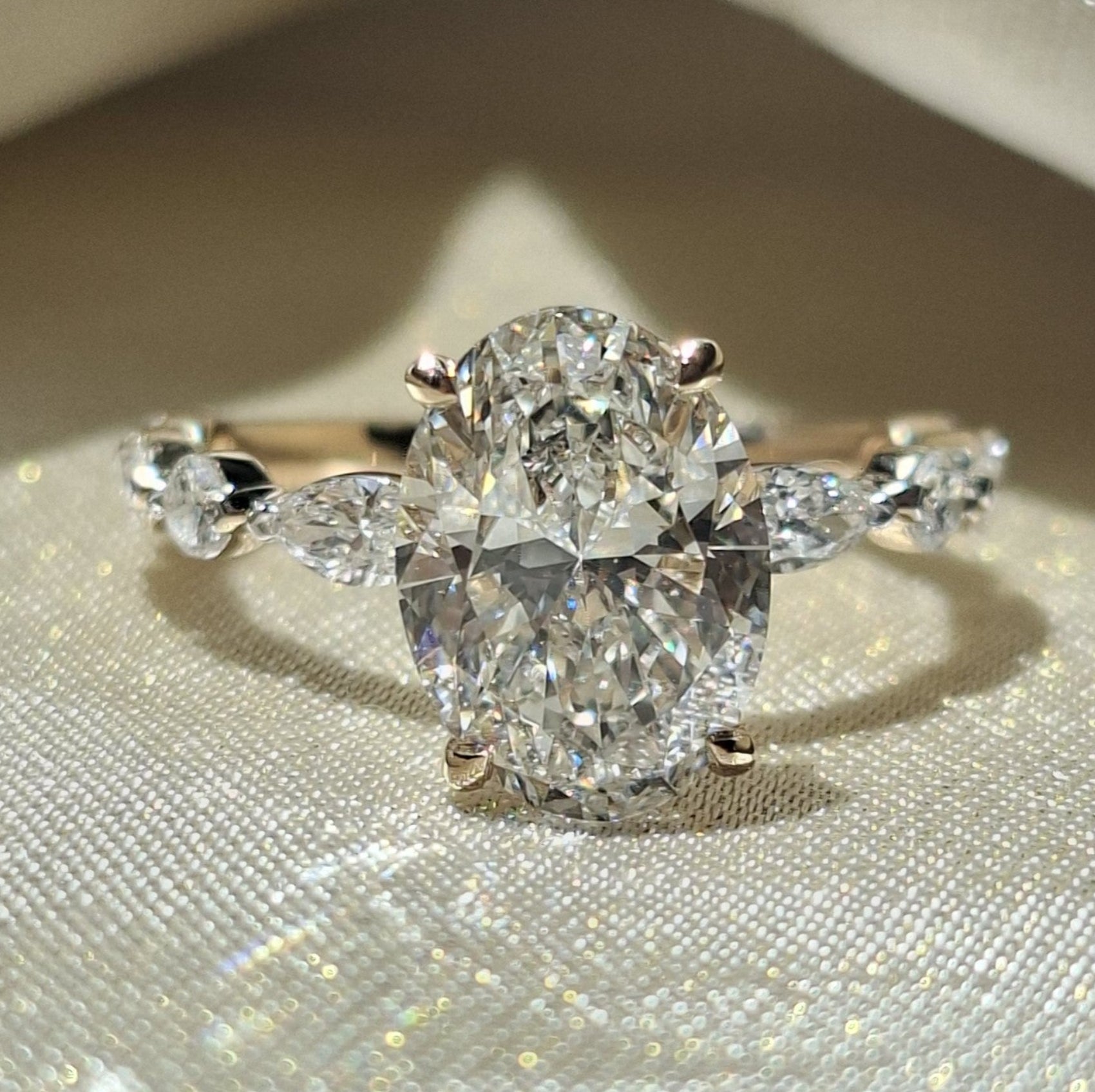 Oval Lab Grown Diamond Engagement Ring Marquise and Round Side Stone